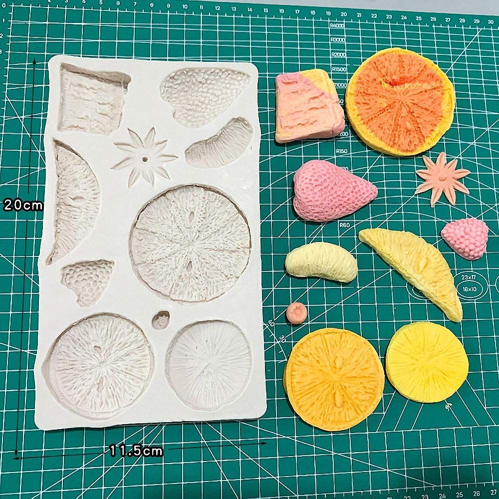 Silicone mold with strawberry, lemon, kiwi, and tangerine slices for DIY cake, fondant, cookies, soap, or pudding crafts.