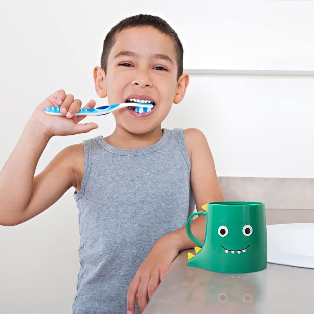 Cute dinosaur-themed plastic bathroom cup for kids, with toothbrush holder and tumbler for baby and kids' dental hygiene.