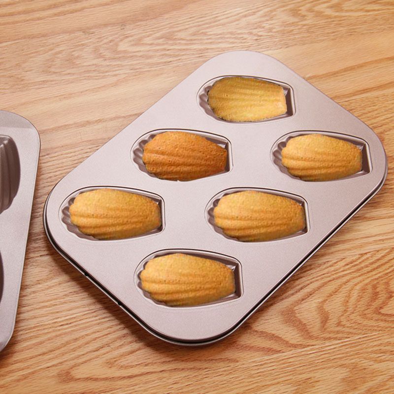 Everything Baby 6-cavity non-stick oval shell mold cake pan for baking cookies and treats in oven, ideal for kids' pretend play.