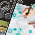 Spiral Art Gear geometric ruler set for drawing, includes 28 plastic templates with spiral and circle designs for kids' art toys.