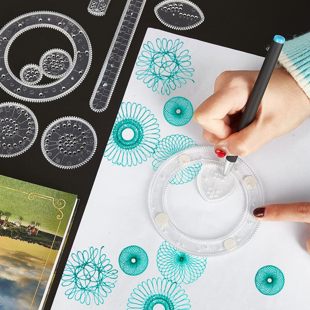Spiral Art Gear geometric ruler set for drawing, includes 28 plastic templates with spiral and circle designs for kids' art toys.
