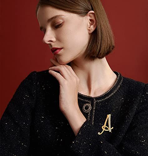 Gold and silver plated script monogram alphabet initial lapel pin brooch for teen women, featuring rose design on a girl's shirt.