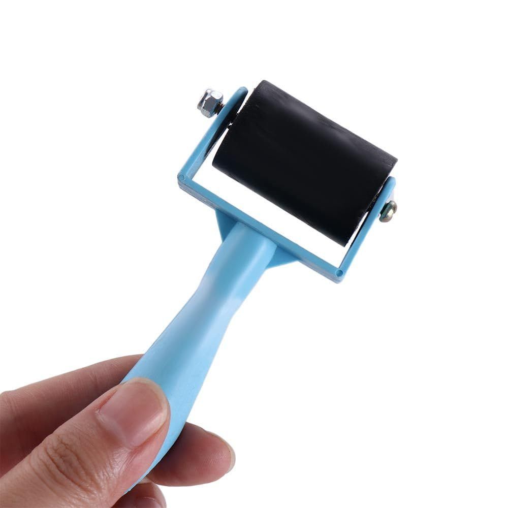 Diamond painting roller tool for pressing and sticking diamonds, made of plastic, used in diamond art projects for kids and adults.