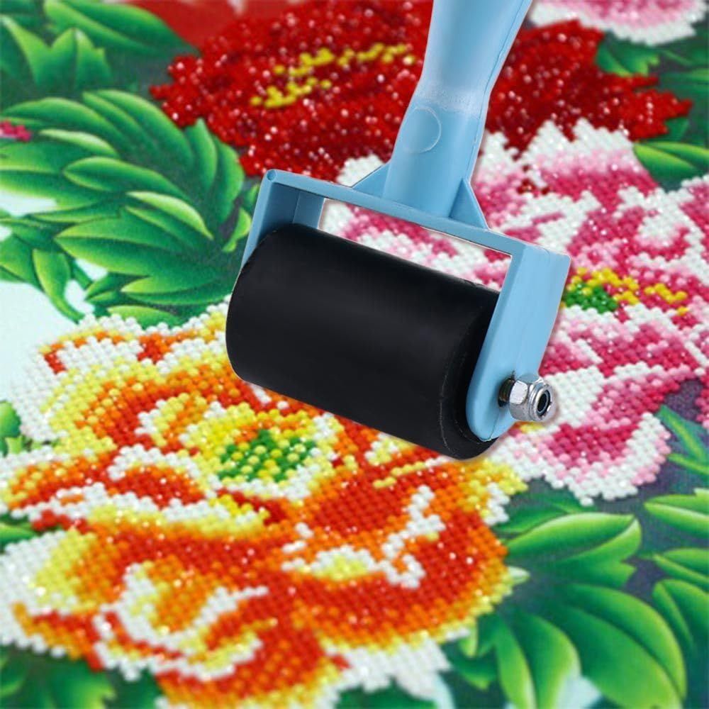 Plastic diamond painting roller tool for pressing and sticking diamonds in art and craft projects, ideal for diamond painting enthusiasts.