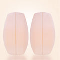 Pair of nude silicone bra strap cushions from Everything Baby, non-slip shoulder pads for comfort and shoulder support.