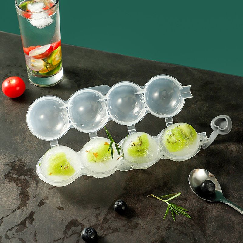 Transparent 4-cavity ice ball mold by Everything Baby, round plastic mold for DIY ice cubes, ideal for bars and parties.