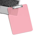 Pink translucent plastic clipboard with low profile metal clip, ideal for office or school use, from Everything Baby.