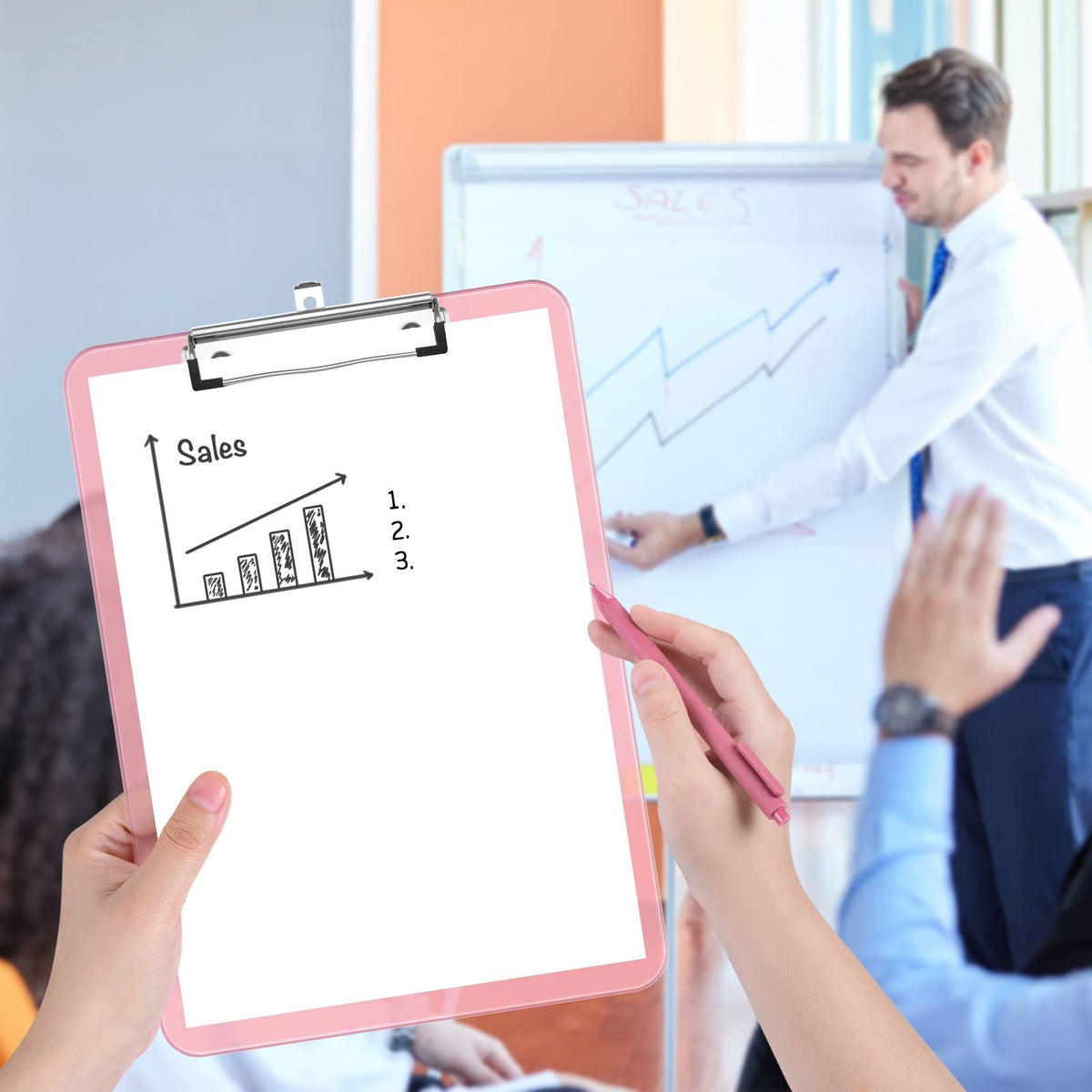 Pink translucent plastic clipboard with a low profile metal clip, ideal for office or school use by Everything Baby.