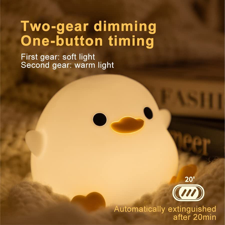 Cute duck-shaped silicone night light for kids, USB rechargeable with touch sensor, ideal for children's rooms and pretend play.