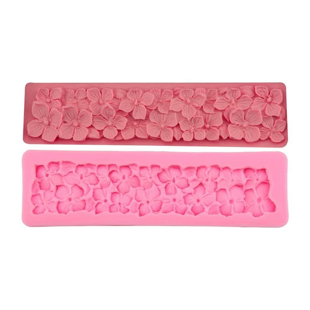 Silicone cake fondant mold with rose flower design for cake decoration, ideal for sugarcraft and baking projects.