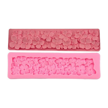 Silicone cake fondant mold with rose flower design for cake decoration, ideal for sugarcraft and baking projects.