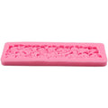 Silicone cake fondant mold with rose flower design for cake decoration, used in sugarcraft and fondant decorating.