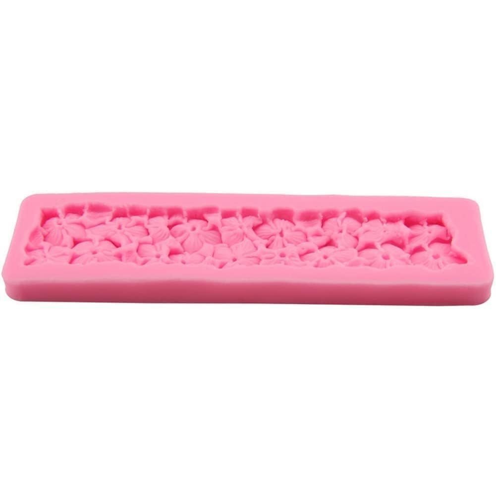Silicone cake fondant mold with rose flower design for cake decoration, used in sugarcraft and fondant decorating.