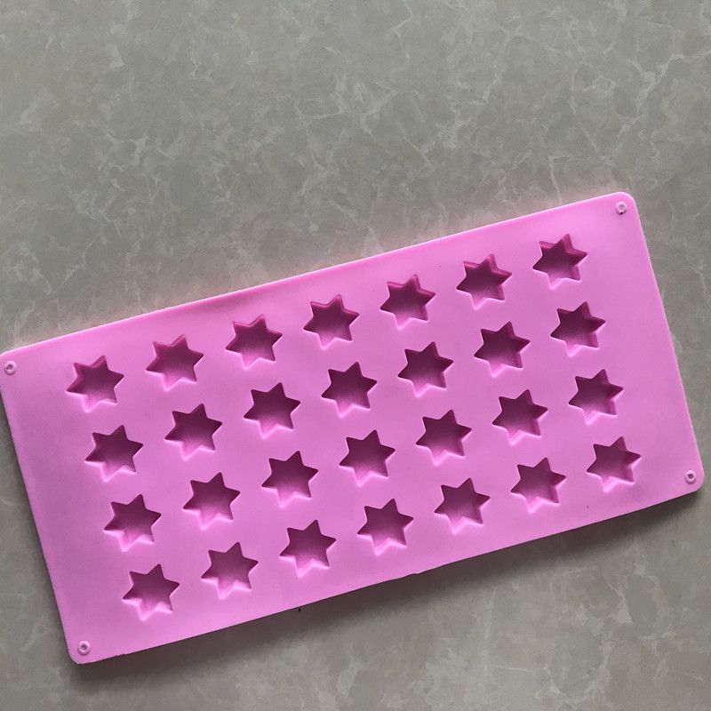 Star-shaped silicone ice cube tray and mold for chocolates, soaps, and Jello, easy-release non-stick design for baby and kids feeding.