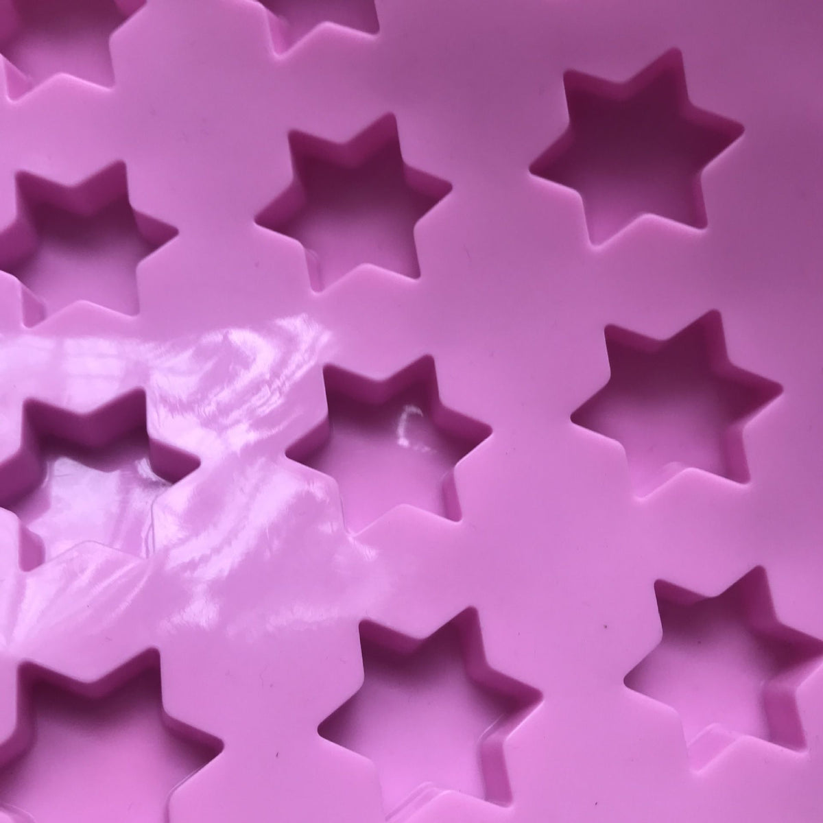 Star-shaped silicone ice cube tray for chocolates, soaps, and jellies, easy-release, non-stick mold for baby and kids feeding uses