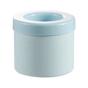 Light blue silicone ice cube tray with cylinder molds for freezing ice cubes for drinks and juices.
