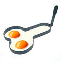 Stainless steel funny egg rings with foldable handle, shaped like a white elephant, for cooking and pretend play in the kitchen.