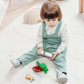 Everything Baby crocodile teeth game for kids, with push-down teeth and alligator design, used for fun dental play and grooming.