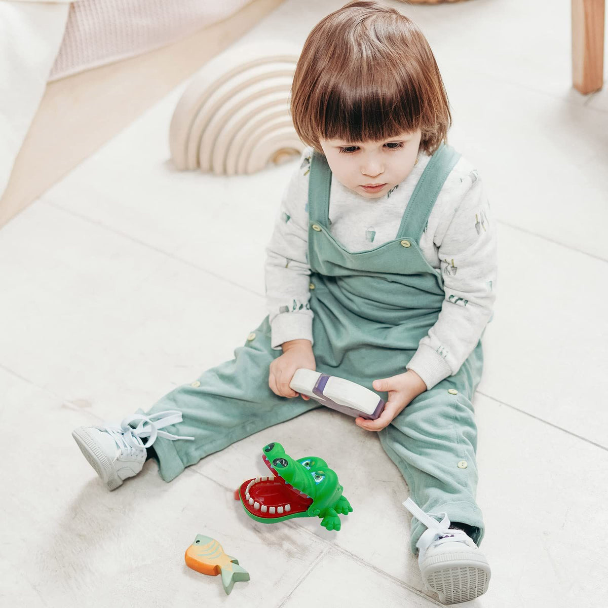 Everything Baby crocodile teeth game for kids, with push-down teeth and alligator design, used for fun dental play and grooming.