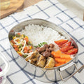 Stainless steel round bento lunch box by Everything Baby, durable, single-layer design for kids' school or outdoor meals.