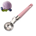 Pink stainless steel ice cream scoop with trigger and non-stick coating, ideal for making fruit balls and serving ice cream.