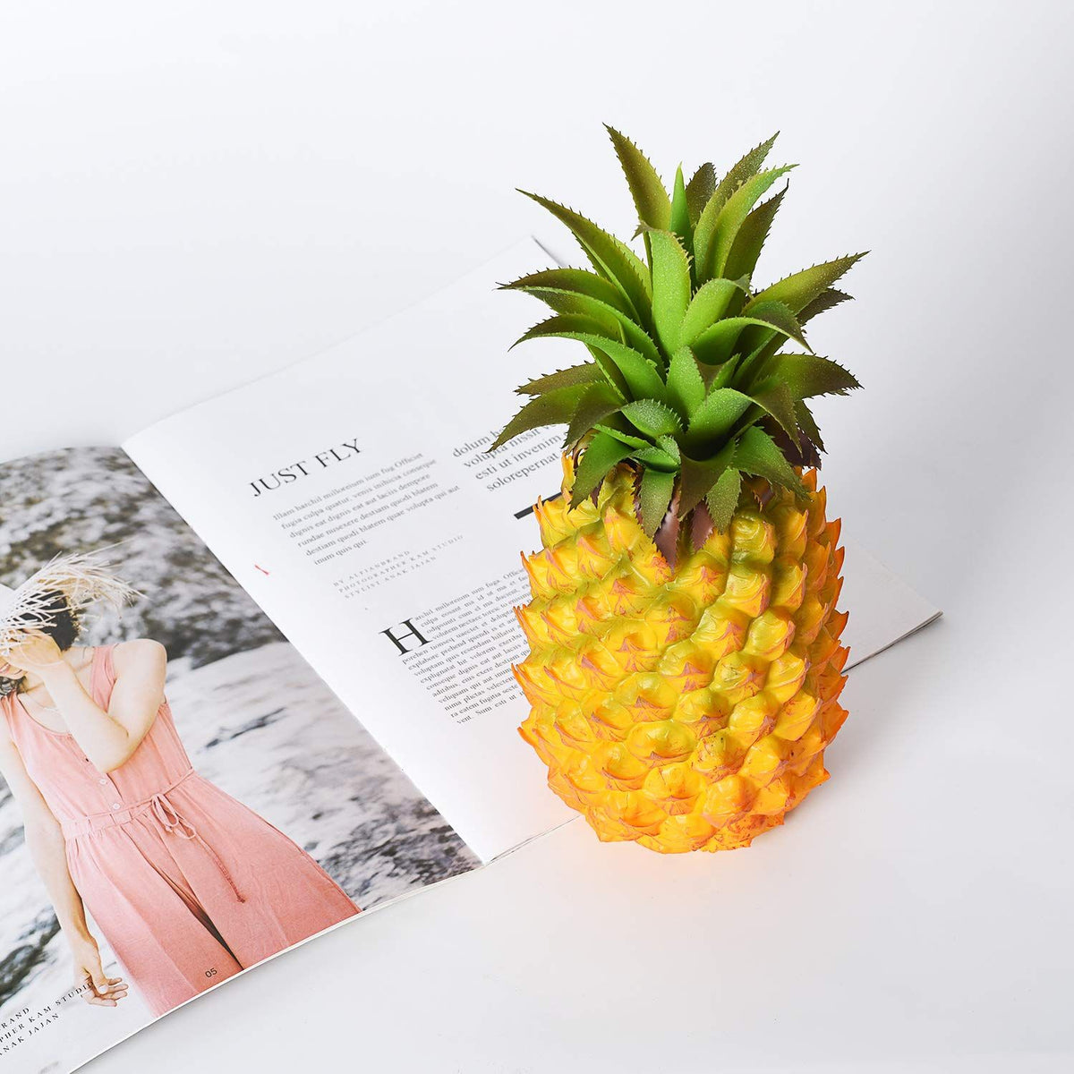 Realistic artificial pineapple toy by Everything Baby, perfect for pretend play and home decor in baby and kids' toy collections
