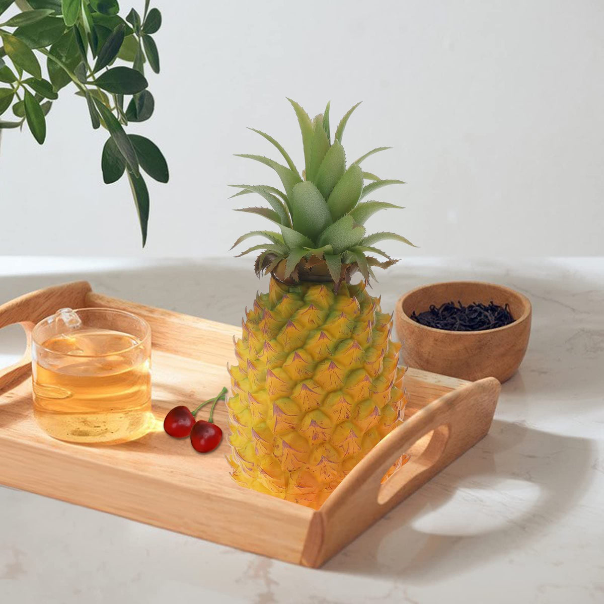 Realistic artificial pineapple toy for pretend play, suitable for home, cabinet, or party decor, by Everything Baby.