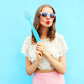 Large oversized giant toothbrush props from Everything Baby, used as comedy costume accessories for kids and baby play sets.