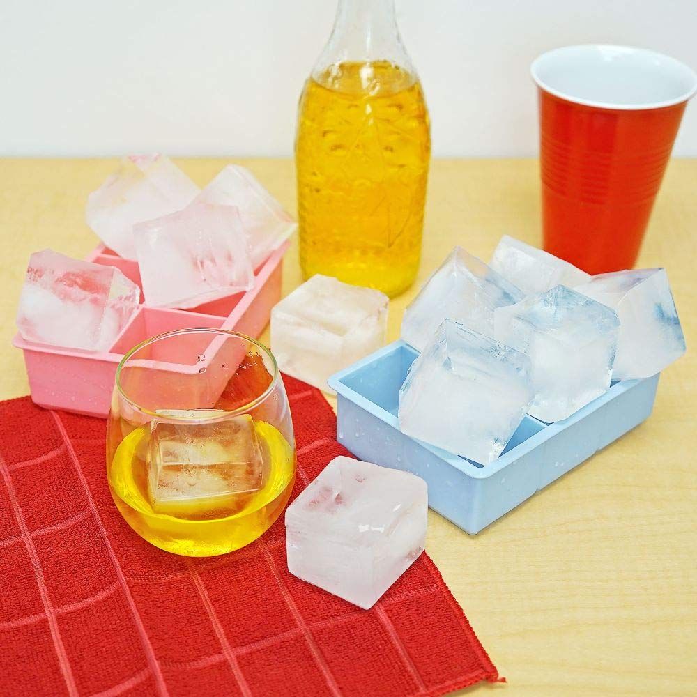 Pink and blue square ice cube trays by Everything Baby, perfect for making large ice cubes for drinks or pretend play.