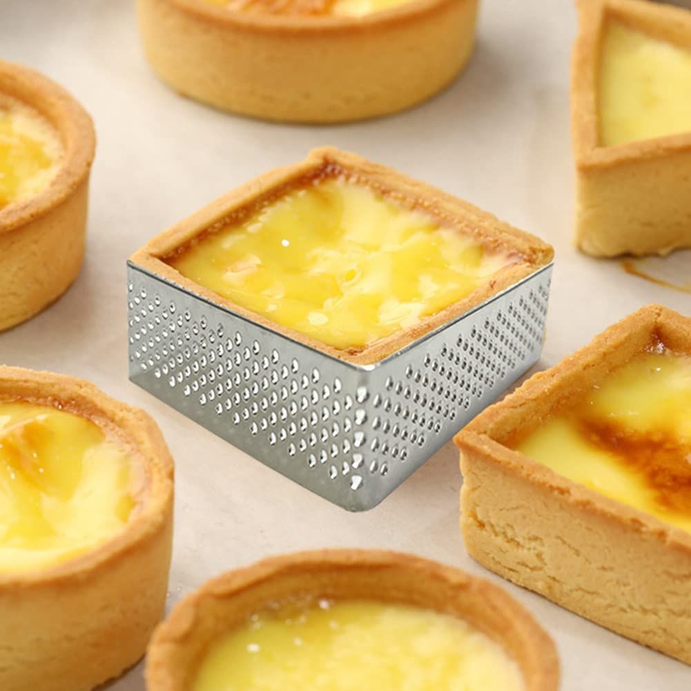 Square oval stainless steel fruit pie ring mold, perforated design, suitable for baking and pretend play in baby and kids' toy collection.