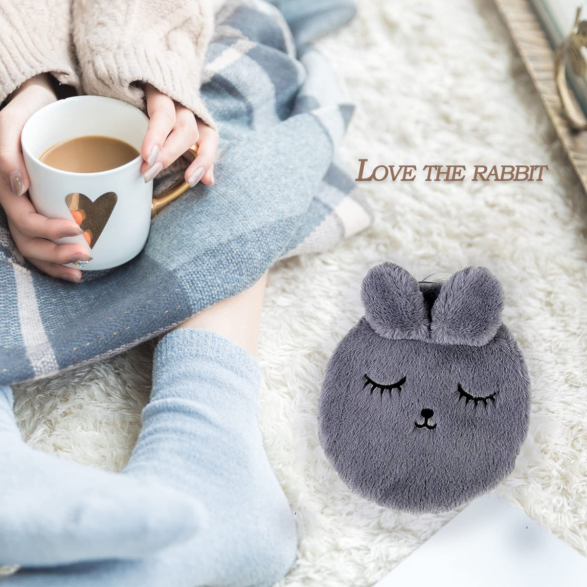 Removable fluffy hot water bottle from Everything Baby, suitable for children and adults, ideal for winter warmth and comfort.