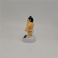 Sumo wrestler solar-powered swinging dashboard ornament for kids' ride-on cars, featuring a playful, solar-powered figure in motion.