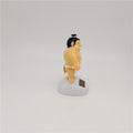 Sumo wrestler solar-powered swinging dashboard ornament for ride-on cars, featuring a playful design by Everything Baby.