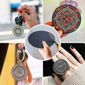 Eight round cardboard art drawing boards with paint holder trays for kids' art and drawing activities by Everything Baby.