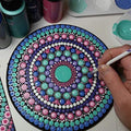 Eight round cardboard art drawing tablets with paint holder trays for kids' art and painting projects by Everything Baby.
