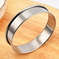 Stainless steel 4.5-inch English muffin rings for baking, nonstick crumpet and tart ring mold, used for home baking.