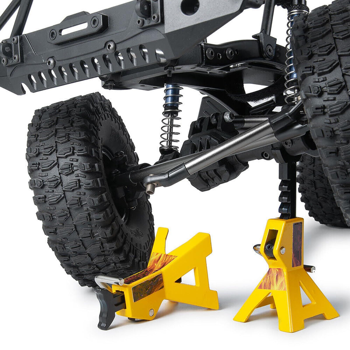Four simulated jack brackets for toy cars and trucks, used for remote control tire replacement in ride-on vehicles by Everything Baby.