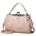 Women’s vintage retro oil wax PU leather handbag with kiss lock closure, crossbody strap, and classic tote design.