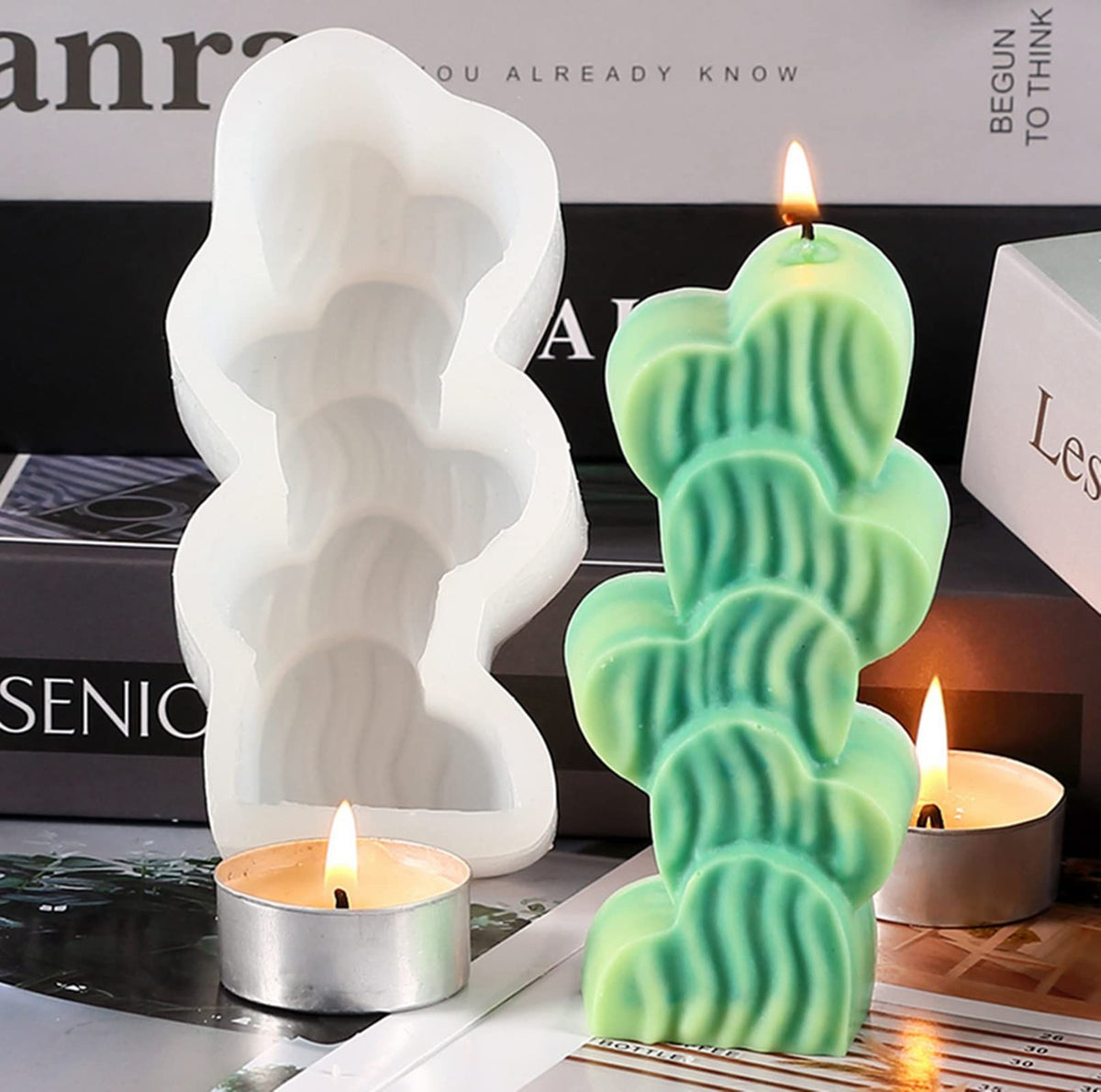 White silicone candle mold with stacking hearts design, perfect for making 3D love-shaped candles, from Everything Baby.