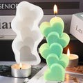 White 4-piece stacking hearts-shaped candle mold by Everything Baby, 3D scattered love silicone mold for making candles.
