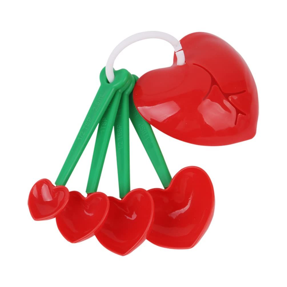 Set of five heart-shaped plastic measuring spoons with egg separator and scoop for baking, cooking, and feeding in the kitchen.