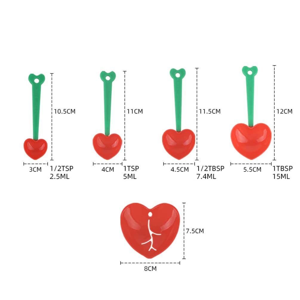 Five heart-shaped plastic measuring spoons set with egg separator and scoop for home kitchen baking and cooking.