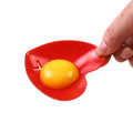 Set of five heart-shaped plastic measuring spoons with egg separator and scoop for kitchen baking and cooking, ideal for home use.