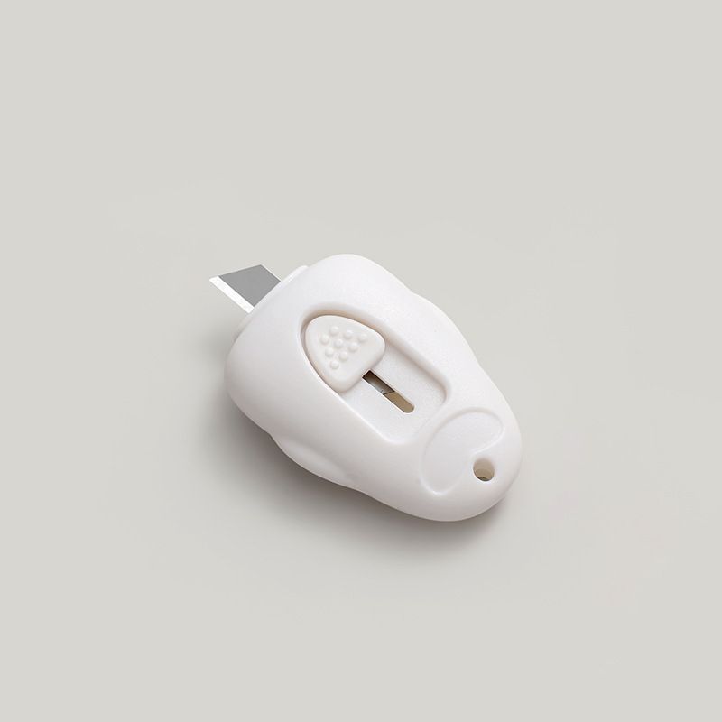 Three mini portable box cutters by Everything Baby, small paper cutters for office or school use, with colorful handles.