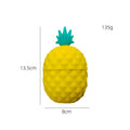 Pineapple-shaped silicone ice roller for face, eyes, and neck, designed for facial beauty and skincare.