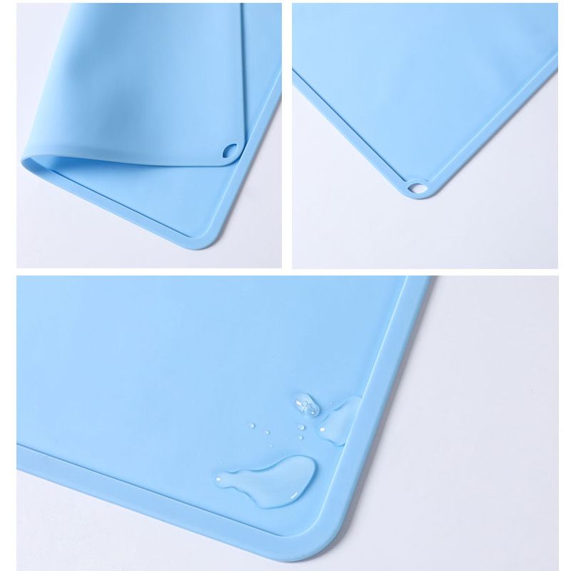 Kids' food mat set by Everything Baby featuring three reusable, non-slip, lightweight food-grade table mats for children.