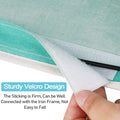 Green bedside hanging storage bag for kids, fits bed rails, holds glasses, books, phones, and keys, by Everything Baby.