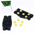 Two pairs of Everything Baby non-slip shoe covers with ice grippers for boys' shoes, designed for winter walking on ice and snow.