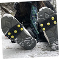 Two pairs of Everything Baby non-slip shoe covers with ice grippers for boys' shoes, designed for walking on ice and snow.