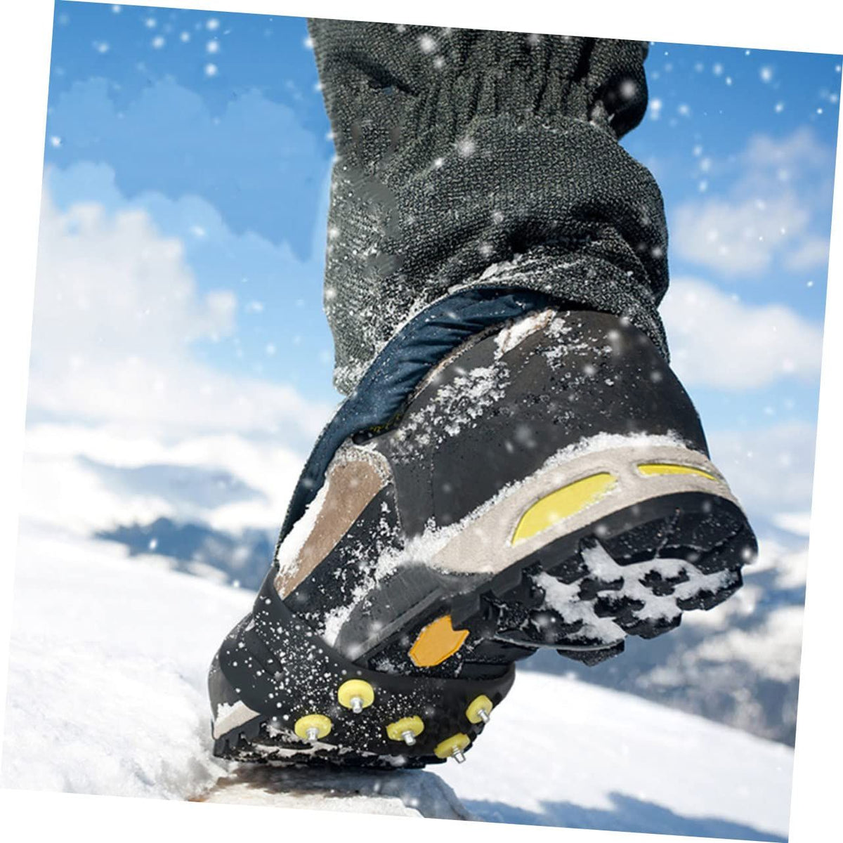 Two pairs of Everything Baby non-slip shoe covers with ice grips designed for boys' shoes, ideal for walking on ice and snow.